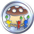 Enthusiast Expedition Badge. The badge shows a Red, Blue, and Yellow Pikmin about to battle a brown mushroom.