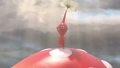 A Red Pikmin standing on a Bulborb in Occupational Hazards.