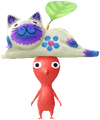 A Red Special Decor Pikmin with Balinese Carving decor from Pikmin Bloom.