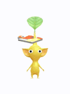 An animation of a yellow Pikmin with a puzzle piece from Pikmin Bloom.