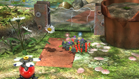Page 1 of the fifth unique hint in the Garden of Hope in Pikmin 3 Deluxe.