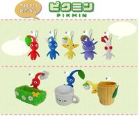Advertisement for the 2013 Pikmin-themed plushes and keychains.
