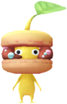 A yellow Decor Pikmin with the Sweetshop costume.