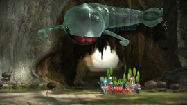 The Armored Mawdad about to attack Alph, Brittany, and their Pikmin.