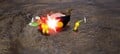 An Anode Beetle being attacked by Red Pikmin and Yellow Pikmin.