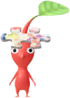 A red Decor Pikmin with a Puzzle Costume.