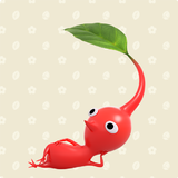 A Red Pikmin laying on its side.