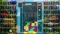 The background for Tetris 99, featuring the game's key art.