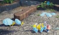 Raw Material being carried by yellow Pikmin