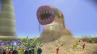 A Sandbelching Meerslug from the E3 2013 version of Pikmin 3.