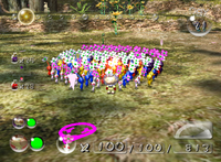 Olimar and a squad of Pikmin in the second game.