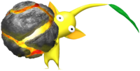 A Yellow Pikmin holds a bomb rock.