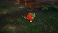 The treasure being carried by some Yellow Pikmin.
