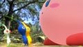 The Pikmin being compared to Kirby's size.