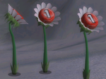 A high quality screenshot of 3 red Pellet Posies in Pikmin 2.