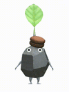 An animation of a Rock Pikmin with a Macaron from Pikmin Bloom.