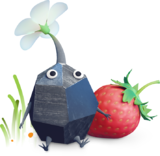 A Rock Pikmin from Pikmin Bloom next to a strawberry.