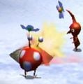 A Red Pikmin and a juvenile Bulbmin destroying a fire geyser.