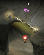 A cropped screenshot showing a slanted electrical wire that has spawned on the curved stump room in Sublevel 11 of the Dream Den.