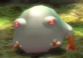 A Wollyhop in Pikmin 2's Piklopedia rubbing its face.