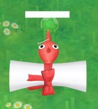 A Pikmin carrying a postcard sent to the player, name censored for privacy.
