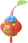 A special winged Decor Pikmin wearing a red Lunar New Year ornament.