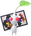 A White Special Decor Pikmin with Flower Card (Volume 2) decor from Pikmin Bloom.