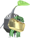 A Rock Special Decor Pikmin with Present Sticker (Gold) decor from Pikmin Bloom.